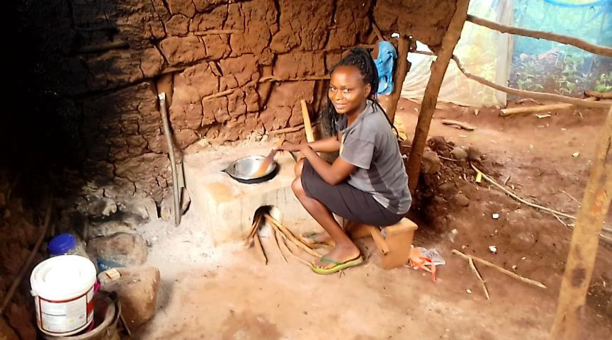 Mary Wairimu a small-scale farmer from Murang’a East subcounty cooking food using energy saving stove that was constructed in collaboration with SACDEP to save on firewood which is scarce in the area and it’s the only source of fuel for cooking